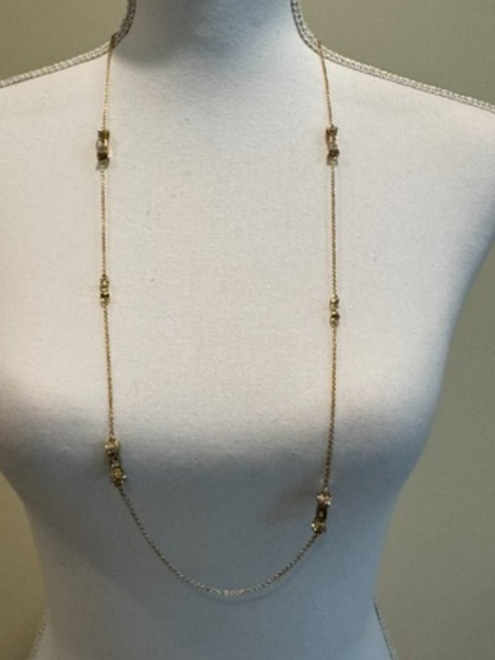 Kate Spade Rhinestone and Gold Bow Necklace